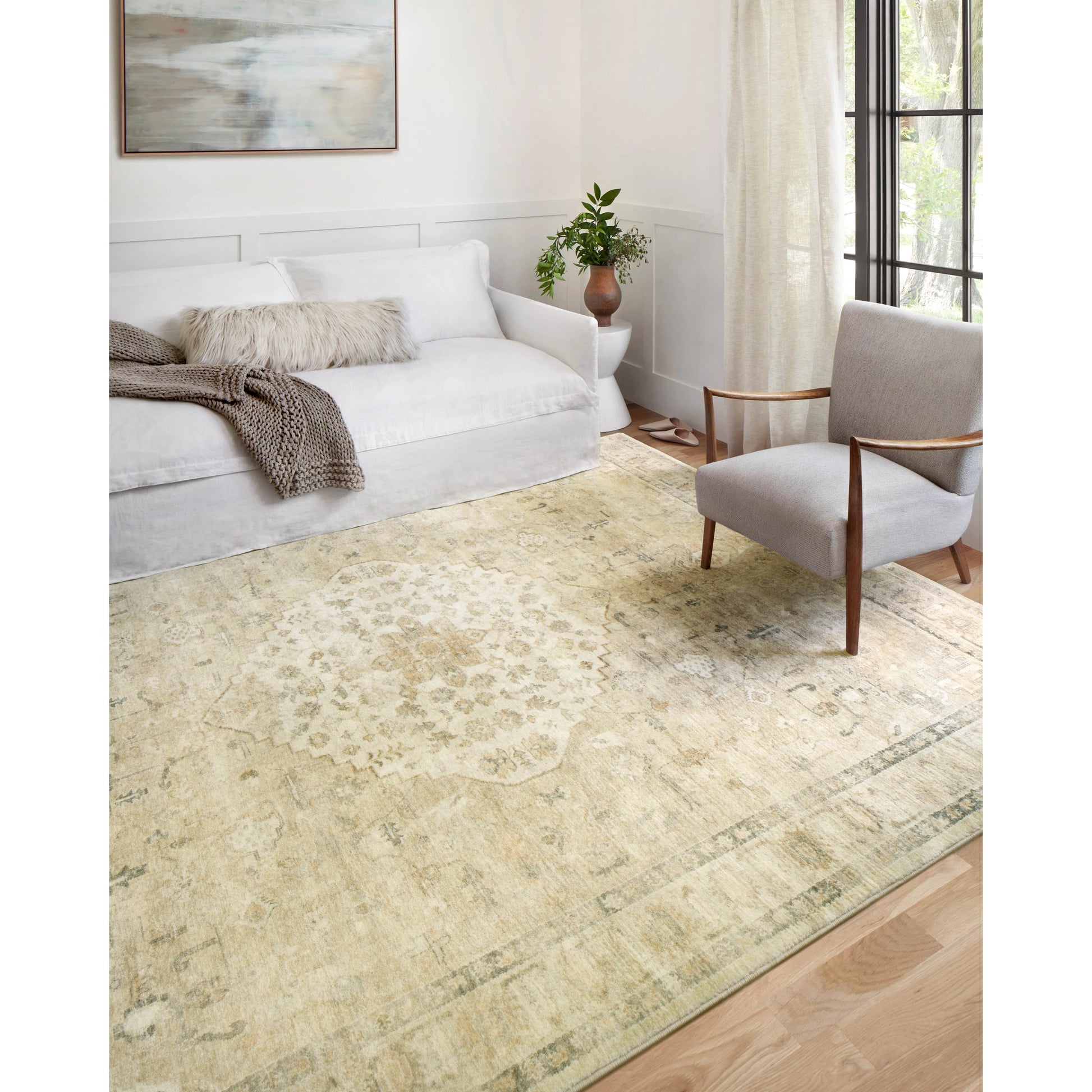 Rosette Emerson Rug by Loloi in sand, ivory. Made from 100% polyester in a traditional style.