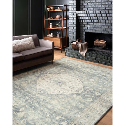 ROS-07 by Loloi in denim, fog. Made from 100% polyester in a traditional style.