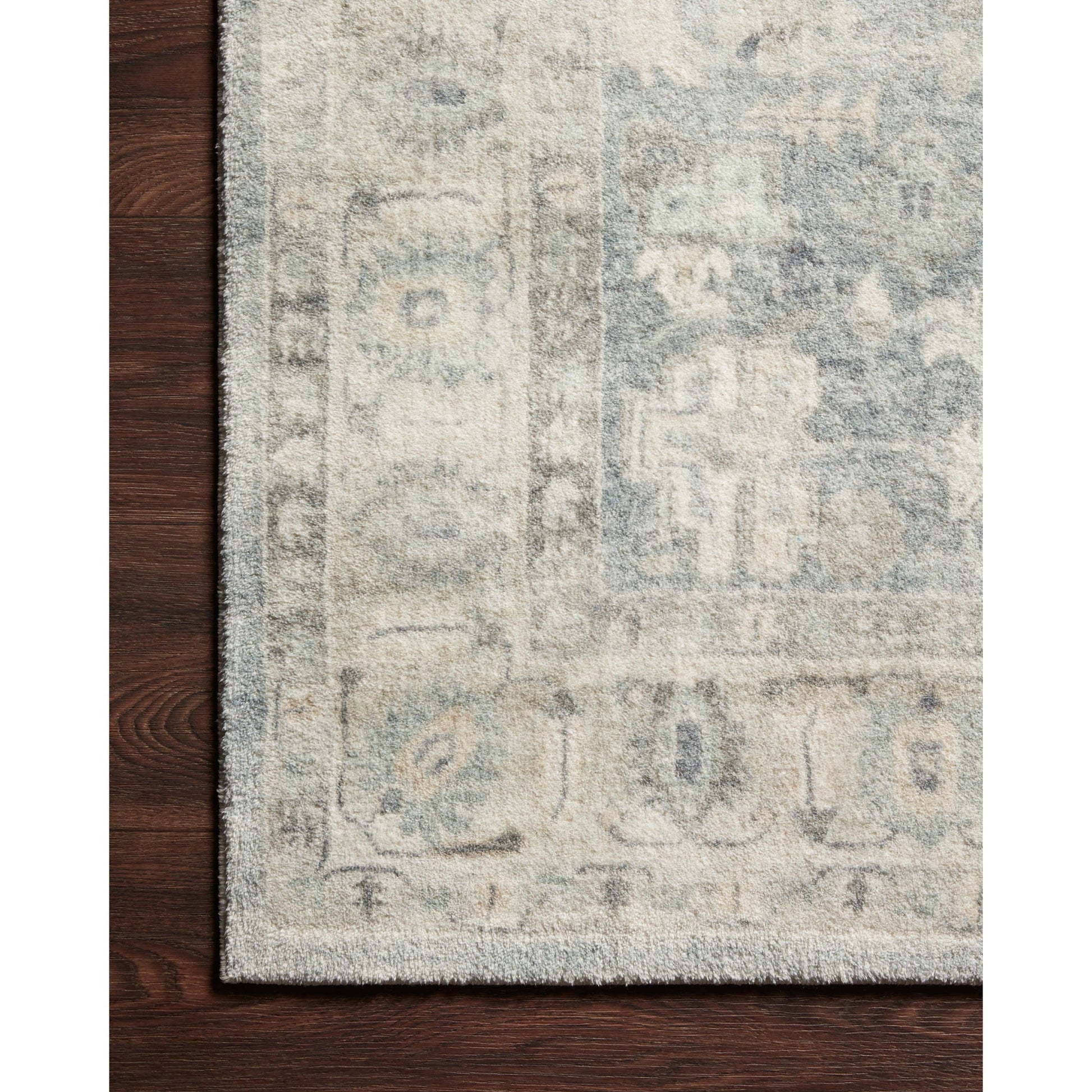 ROS-07 by Loloi in denim, fog. Made from 100% polyester in a traditional style.