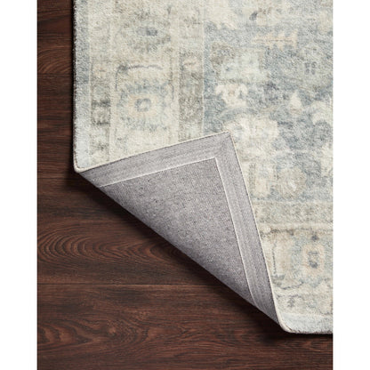 ROS-07 by Loloi in denim, fog. Made from 100% polyester in a traditional style.