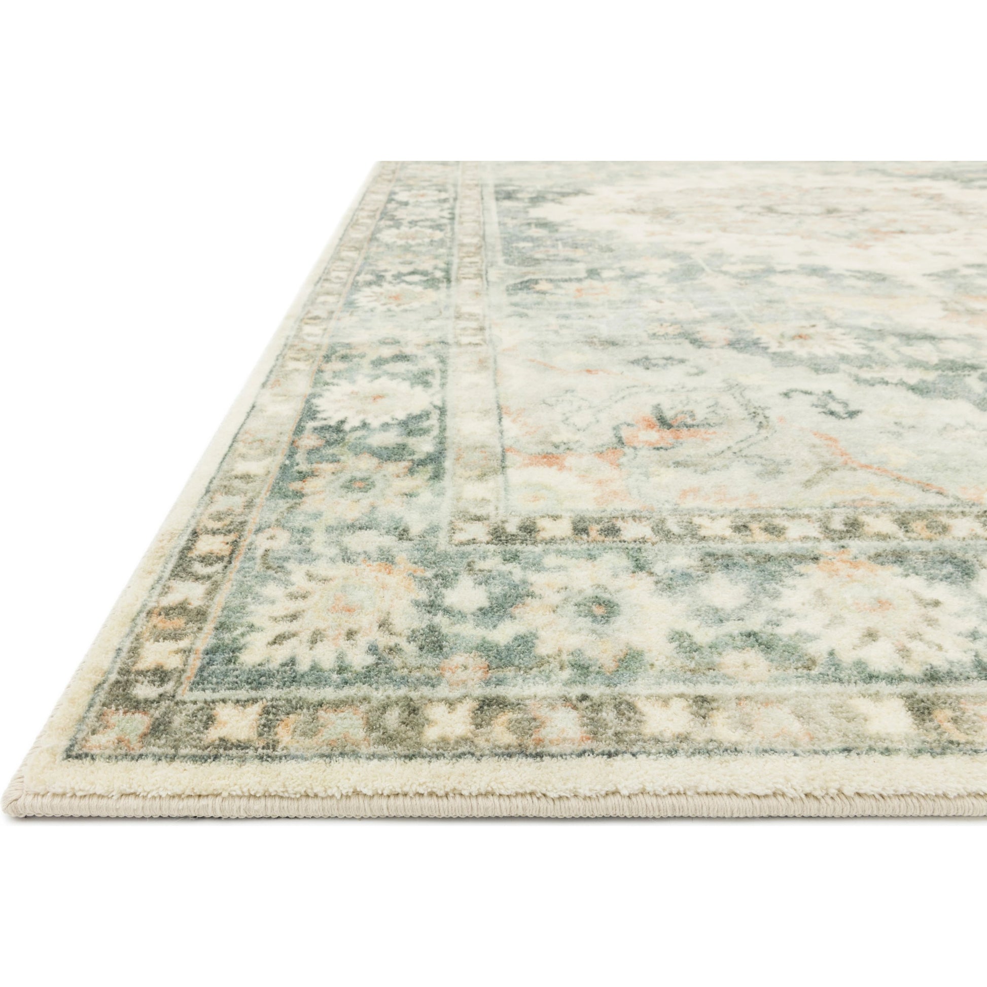 Rosette Colette Rug by Loloi in teal, ivory. Made from 100% polyester in a traditional style.