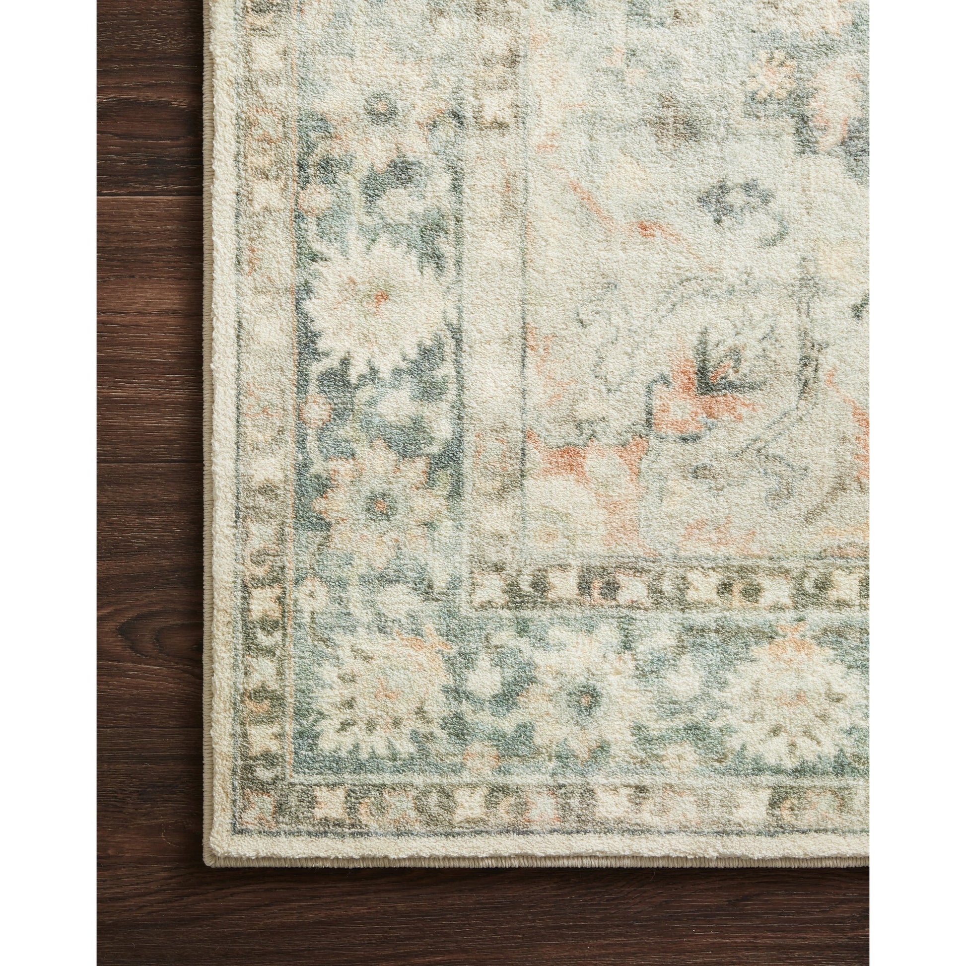 Rosette Colette Rug by Loloi in teal, ivory. Made from 100% polyester in a traditional style.