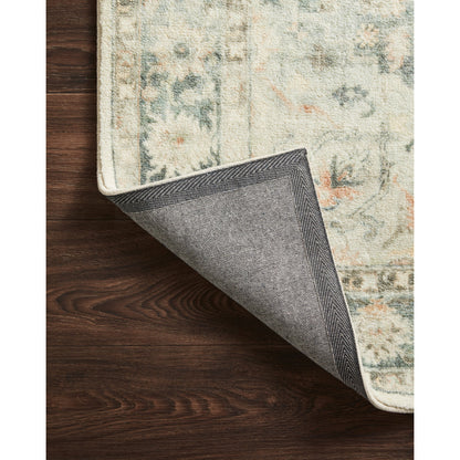 Rosette Colette Rug by Loloi in teal, ivory. Made from 100% polyester in a traditional style.
