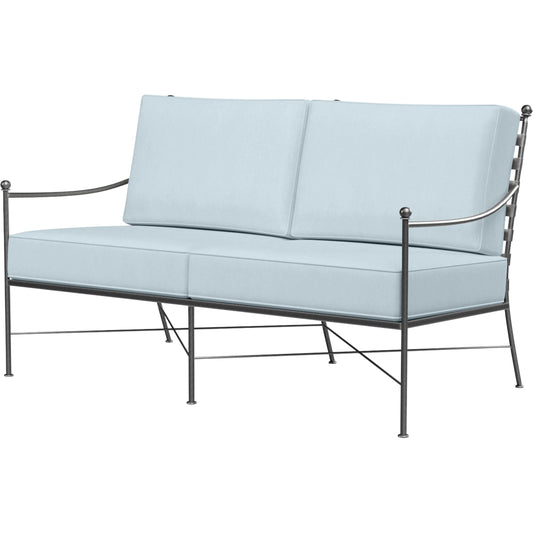 Provence Outdoor Loveseat by Sunset West. Made from wrought iron in a modern style.