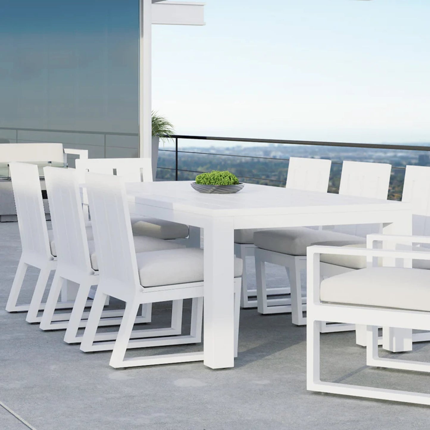 003 SI-2167155 | Lifestyle | Newport Outdoor 90" Dining Table by Sunset West in frost. Made from aluminum in a modern style.