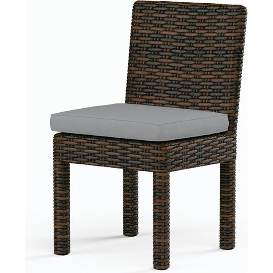 Montecito Outdoor Armless Dining Chair by Sunset West in cognac. Made from resin wicker in a modern style.