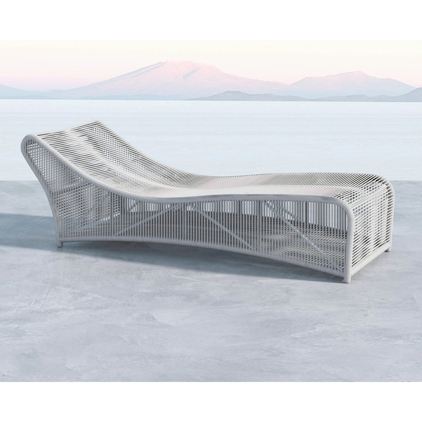 005 SI-2167075 | Lifestyle | Miami Outdoor Cushionless Chaise by Sunset West in frost. Made from olefin rope in a coastal style.