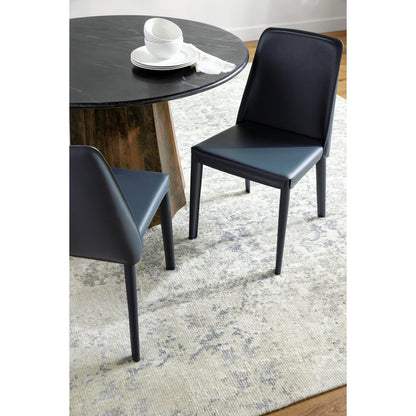 Rosy Dining Chair (Set of 2) by Surya in dark blue and hand finished. Made from upholstery: pvc, base: metal, fill: 100% polyurethane foam in a modern style.