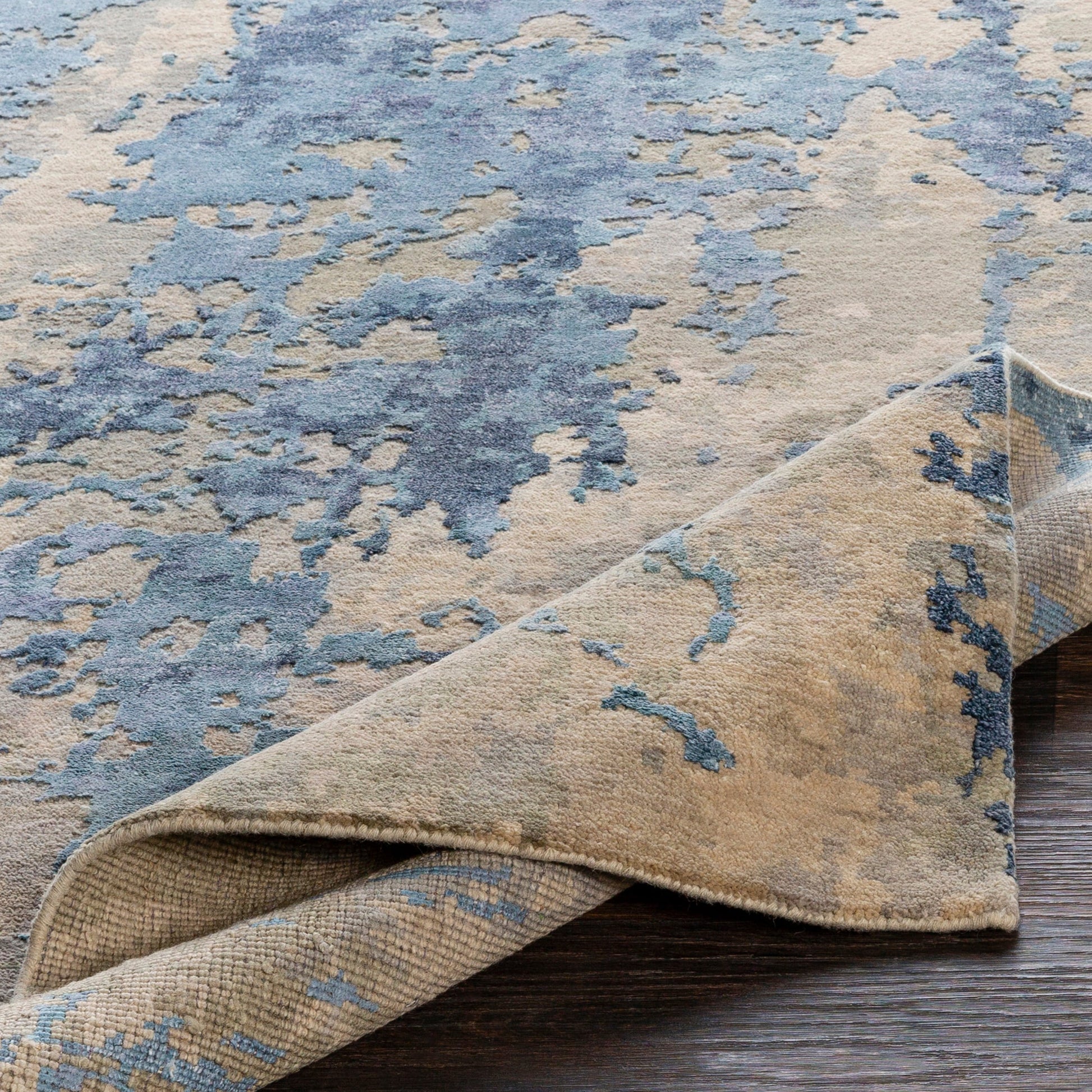 Arte Rug - 23024 by Surya in navy, denim, pale blue, sage, tan, medium gray. Made from 60% wool, 40% viscose in a unique style.