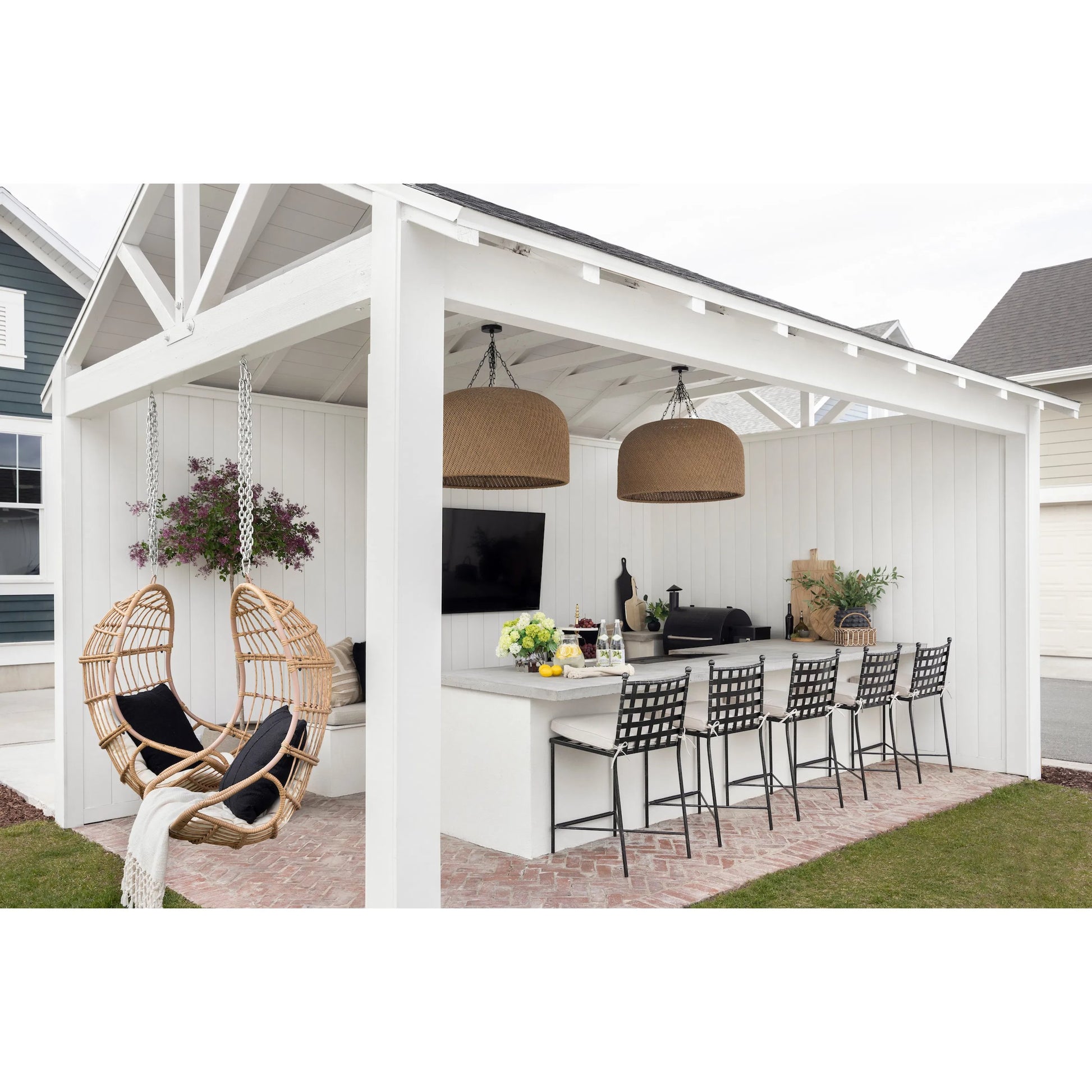Provence Outdoor Barstool by Sunset West. Made from wrought iron in a modern style.