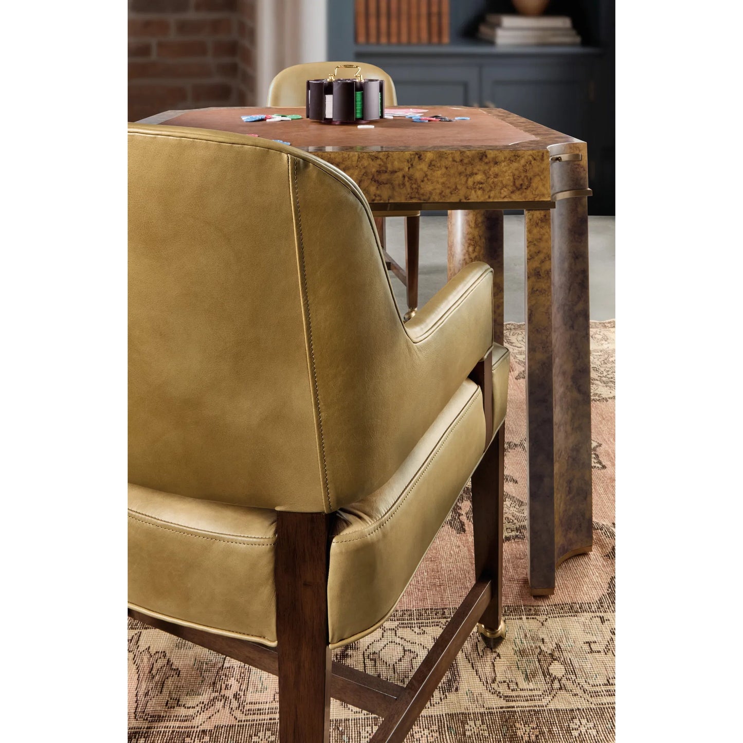004 SI-2458411 | Closeup | Archives Game Chair by Hooker Furniture in classic walnut, quartered walnut veneers. Made from wood, leather, hair on hide leather in a traditional style.