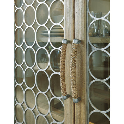 Surfrider Display Cabinet by Hooker Furniture in driftwood. Made from pecan veneers, puck light, metal, tempered glass, rope in a coastal style.