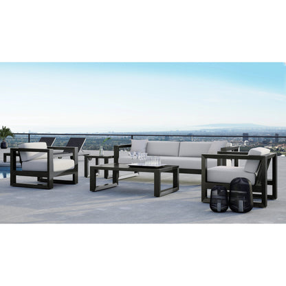 Redondo Outdoor End Table by Sunset West in slate. Made from aluminum in a modern style.