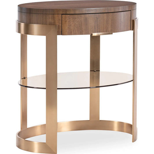 001 SI-2458587 | Primary Silo | Eleana Oval Nightstand by Hooker Furniture in light caramel, quartered walnut veneers, sunlit bronze metal. Made from walnut veneers, metal, glass in a modern style.