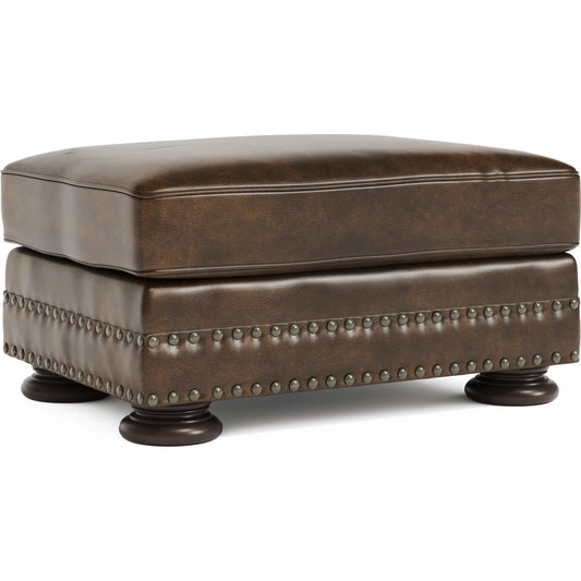 Foster Leather Ottoman by Bernhardt in molasses. Made from wood, leather in a traditional style.