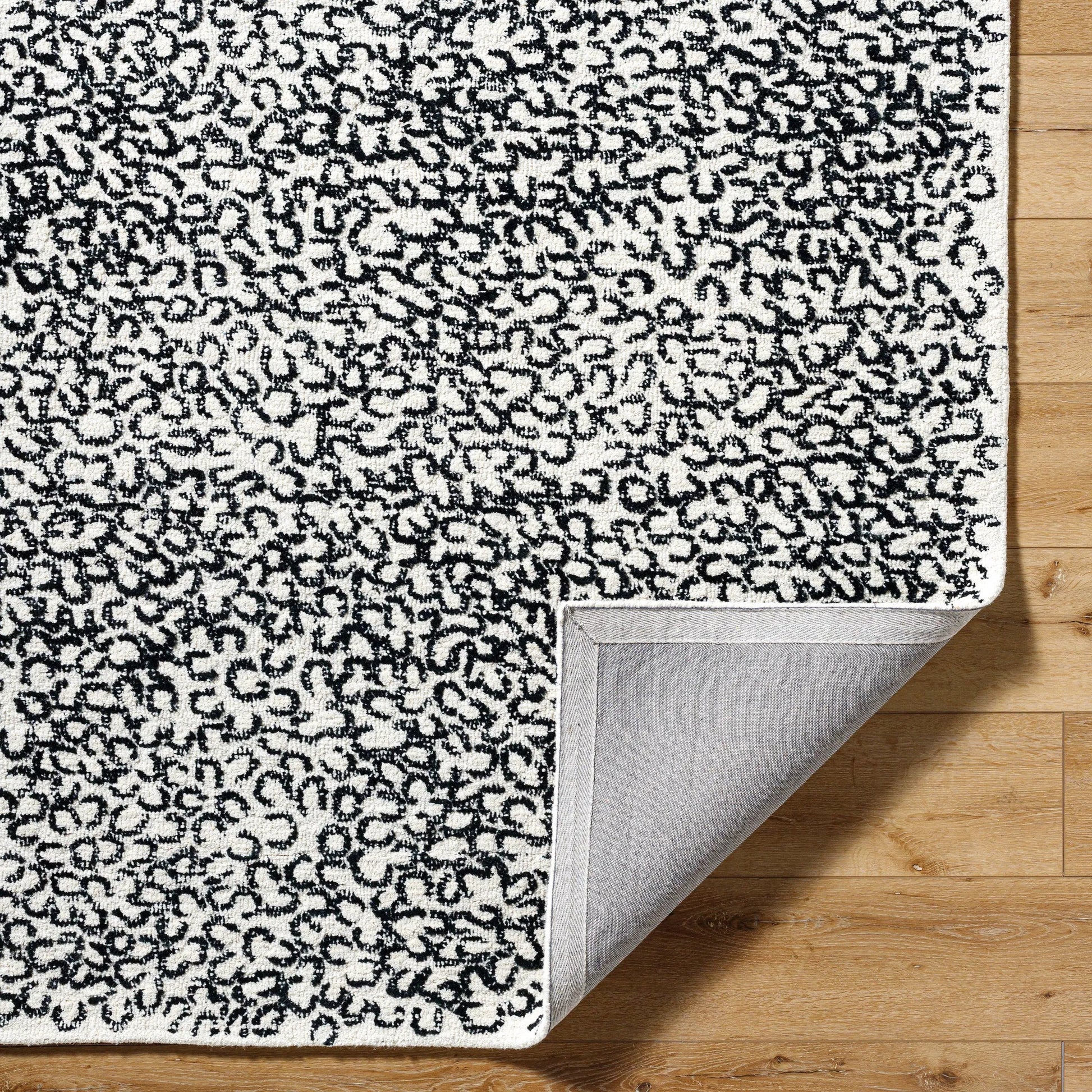 Rize Rug - 488617 by Livabliss in charcoal, ash gray, snow white. Made from wool in a unique style.