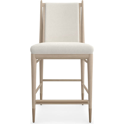 Unity Light Counter Stool by Caracole. Made from oak in a unique style.