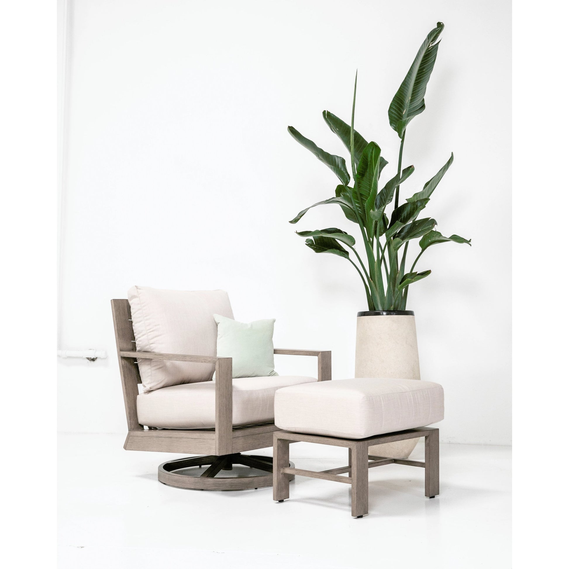 Laguna Outdoor Swivel Chair by Sunset West in browns. Made from aluminum in a modern style.