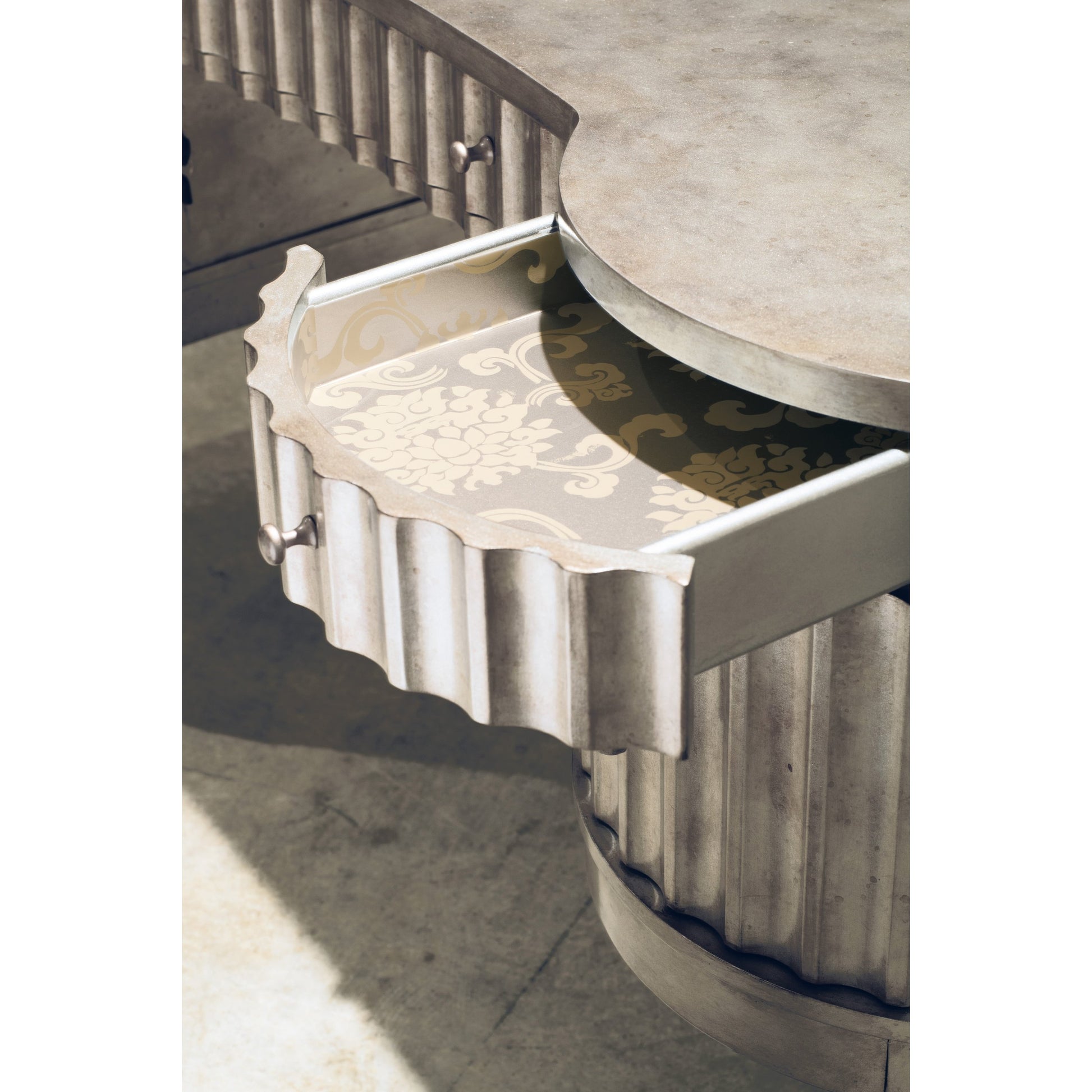 Fluted Kidney Desk by Hooker Furniture in silver. Made from hardwoods in a eclectic & global style.