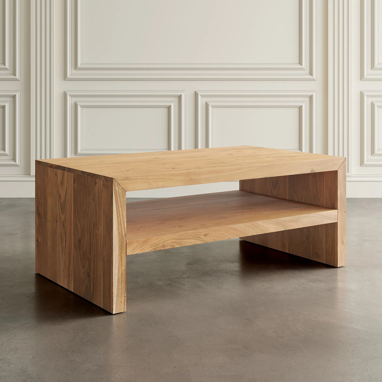 Minimalist solid wood coffee table with clean lines and open shelf storage, showcased in a modern interior—shop now on sale.