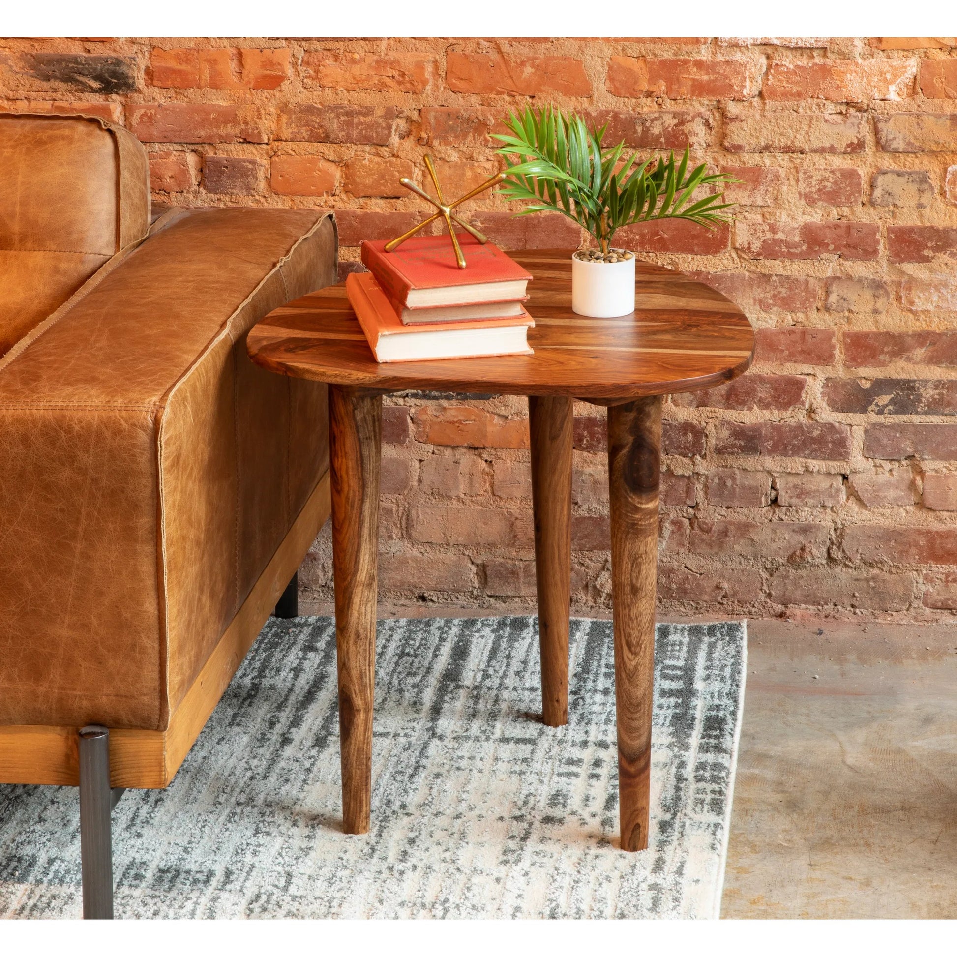 Arrey 23" Side Table by World Interiors in russett and natural. Made from sheesham wood in a transitional style.