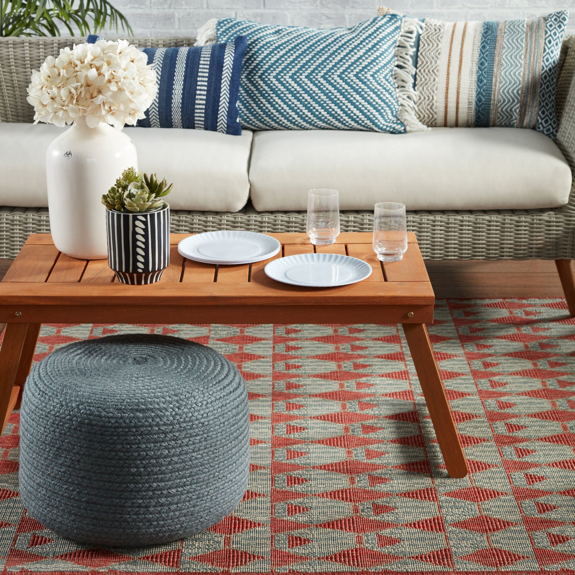 Saba Solar SAS01 Indoor/Outdoor Pouf by Jaipur Living. Made from 100% polyester in a coastal style.