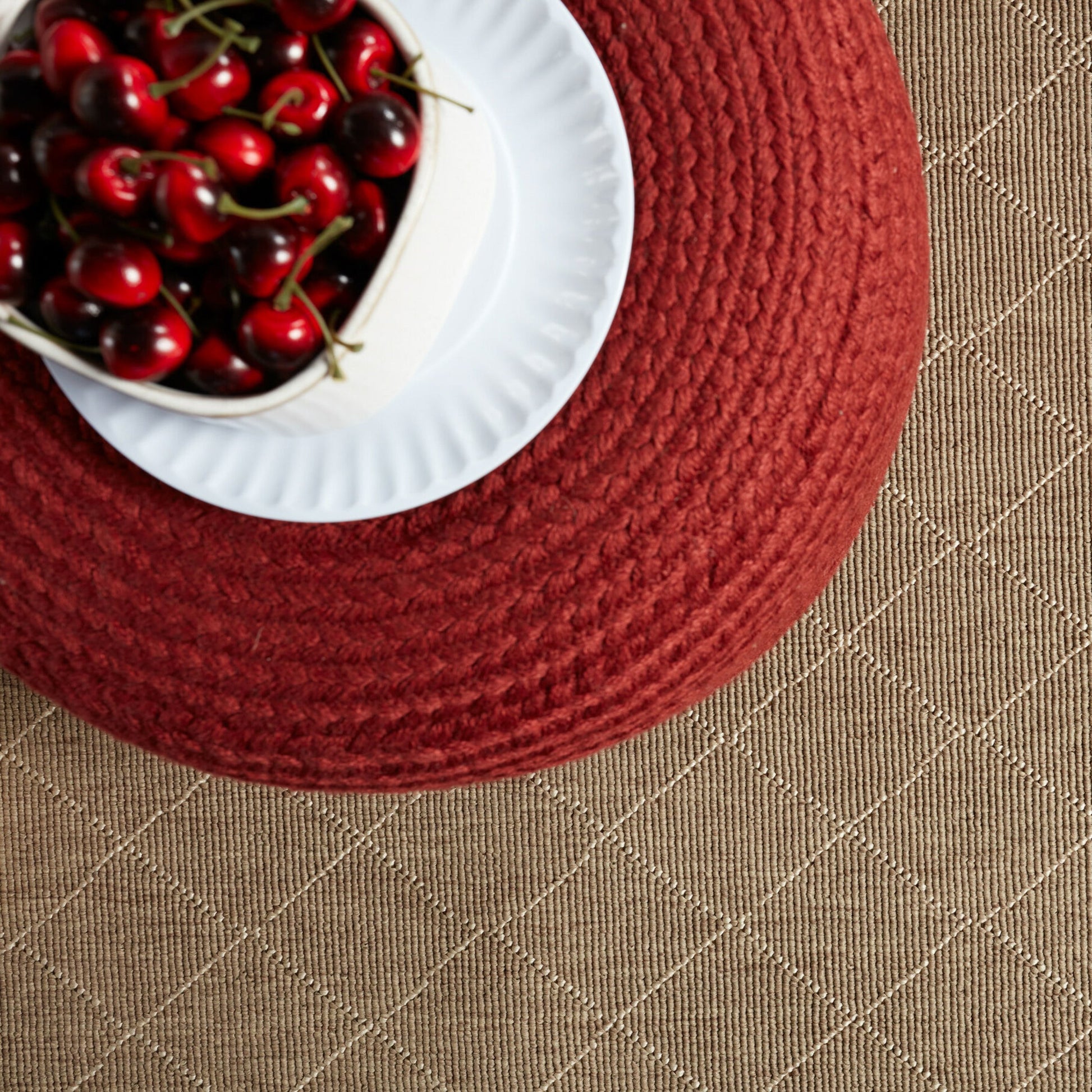 Saba Solar SAS01 Indoor/Outdoor Pouf by Jaipur Living. Made from 100% polyester in a coastal style.