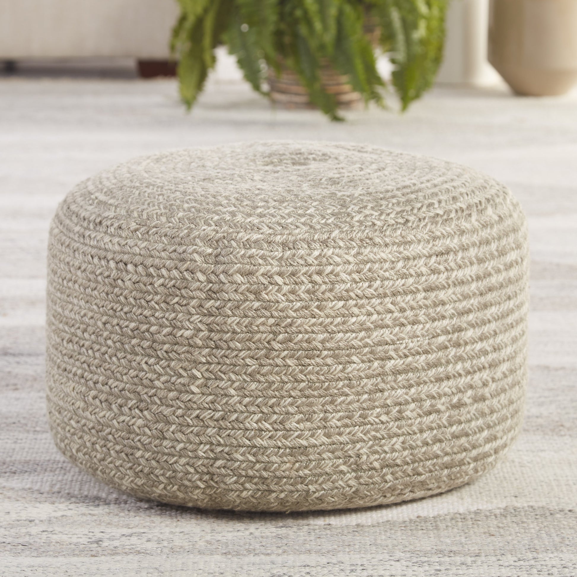Saba Solar SAS01 Indoor/Outdoor Pouf by Jaipur Living. Made from 100% polyester in a coastal style.
