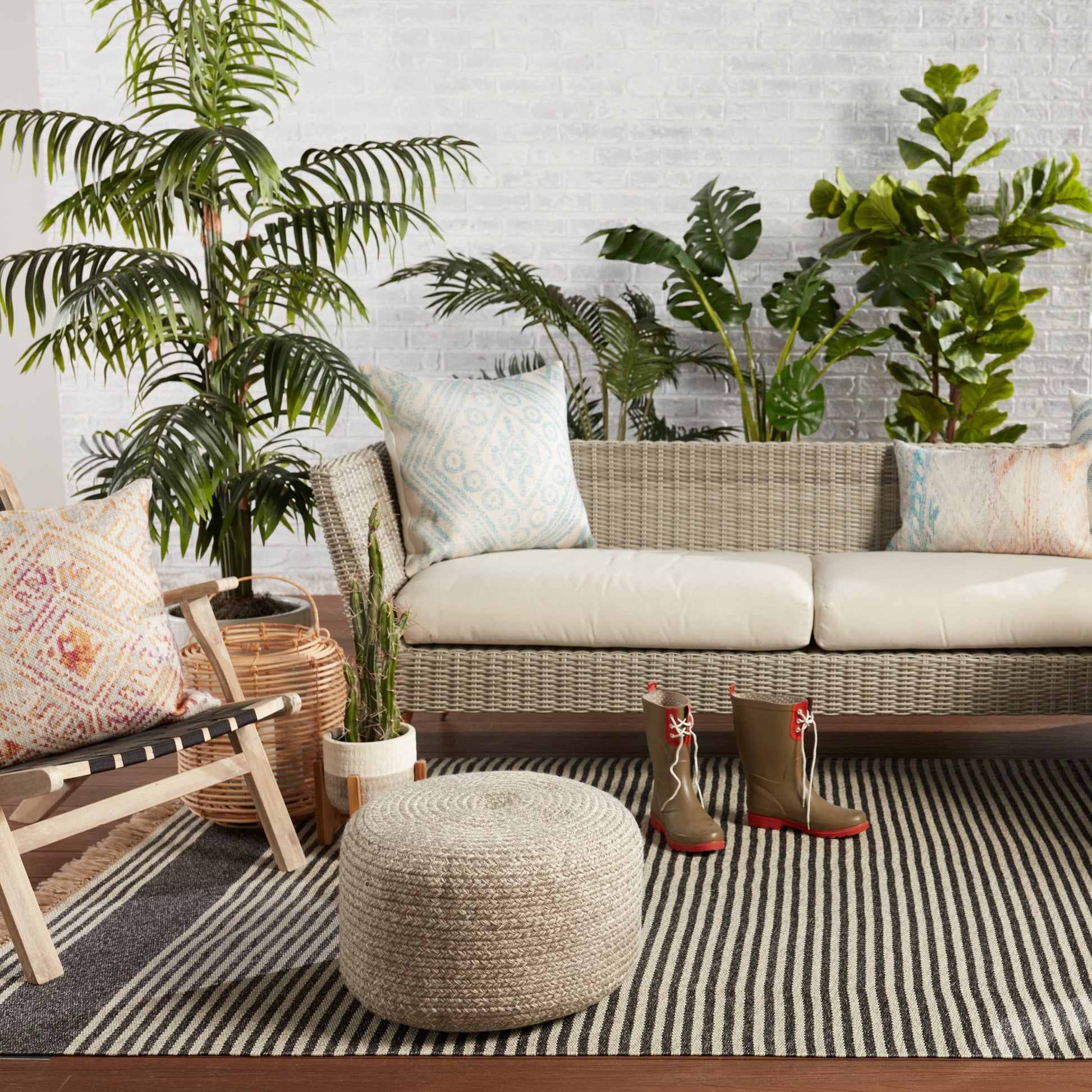 Saba Solar SAS01 Indoor/Outdoor Pouf by Jaipur Living. Made from 100% polyester in a coastal style.