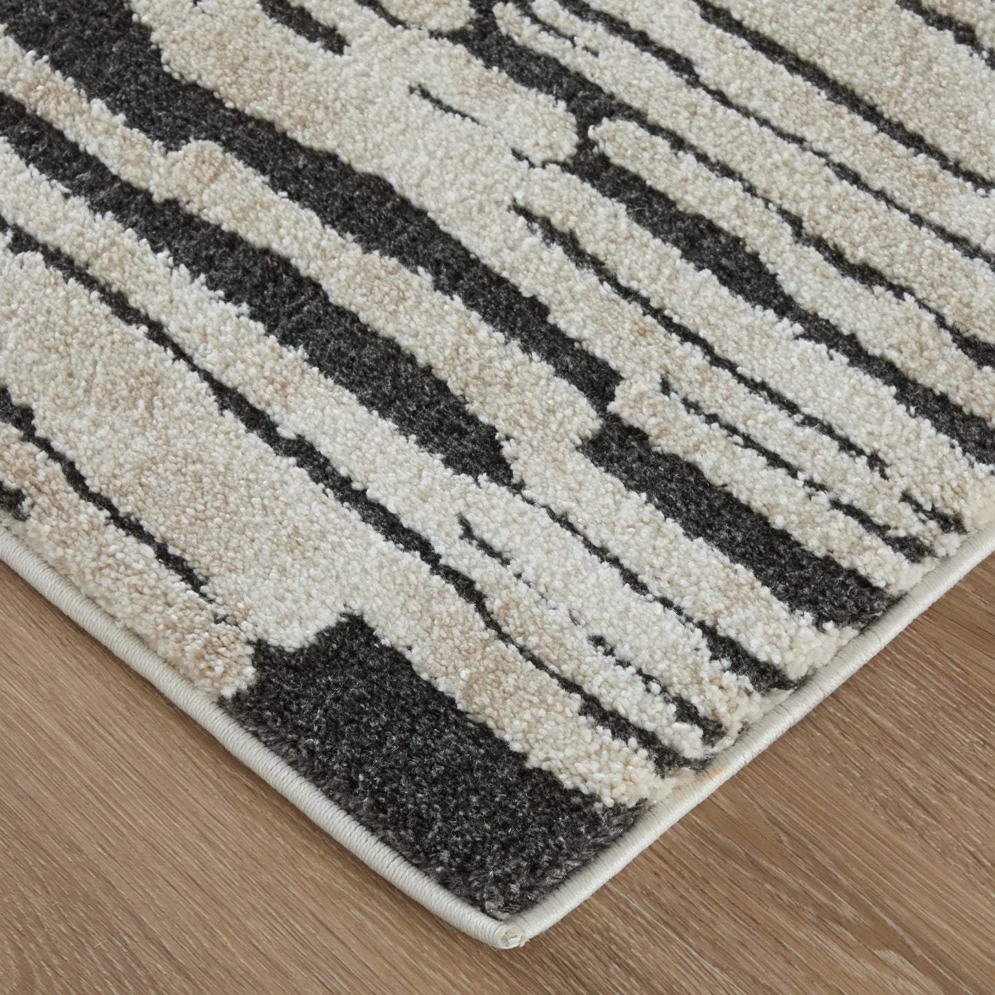 001 SI-2635527,SI-2635528,SI-2635529,SI-2635530,SI-2635531 | Closeup | Gilmore Stripes GIL39UPF Rug by Feizy in ivory, black. Made from polypropylene in a unique style.