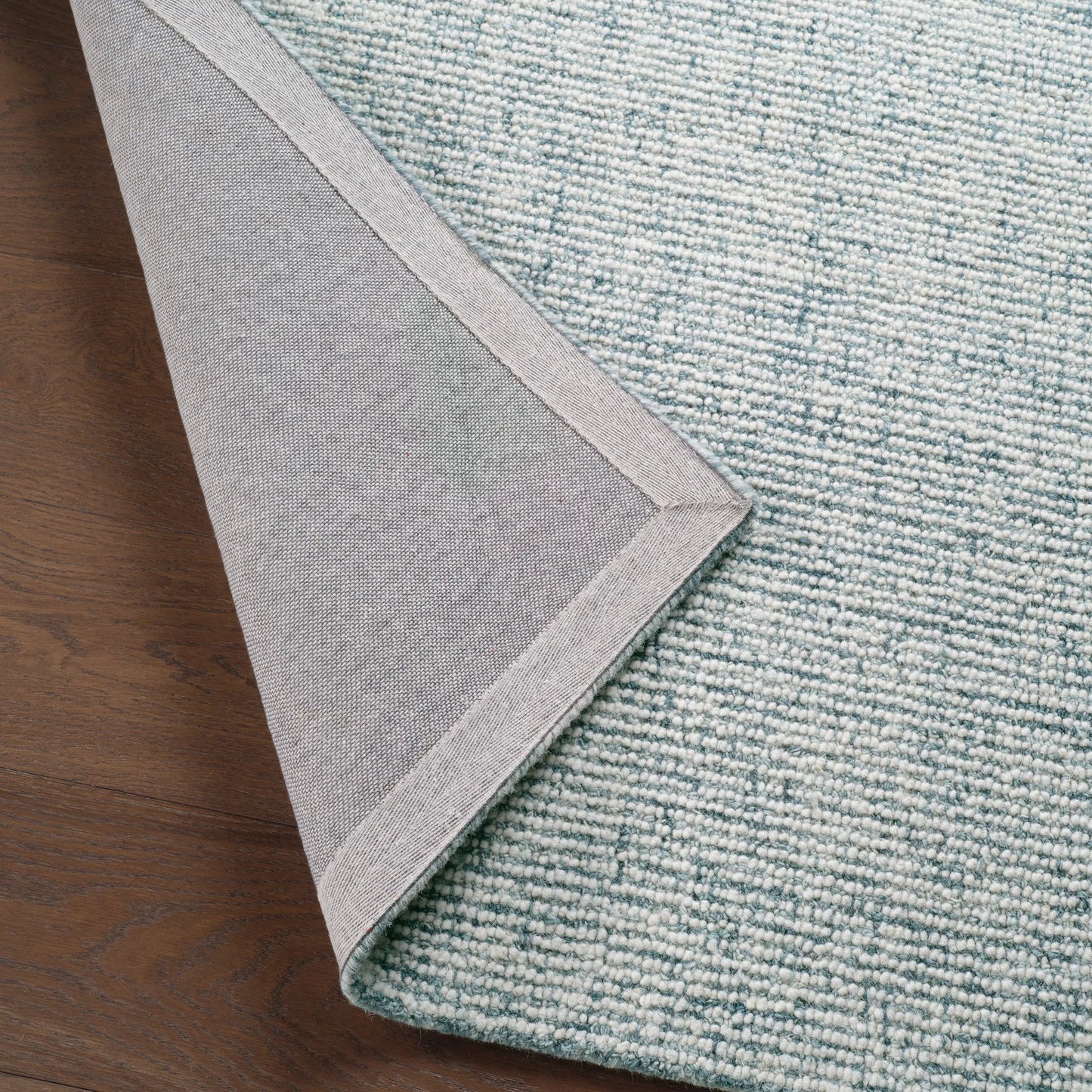 008 SI-2542835,SI-2542836,SI-2542837,SI-2542838,SI-2542839,SI-2542840 | Lifestyle | Sublime Texture SBL02 Rug by Jaipur Living in blue. Made from 100% wool in a unique style.