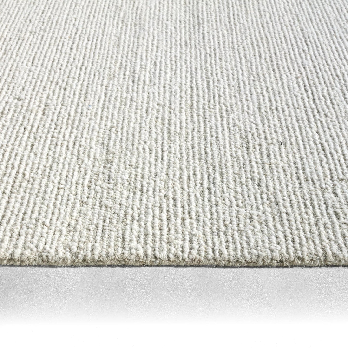 003 SI-2542841,SI-2542842,SI-2542843,SI-2542844,SI-2542845,SI-2542846 | Closeup | Sublime Texture SBL03 Rug by Jaipur Living in gray, ivory, white. Made from 100% wool in a unique style.