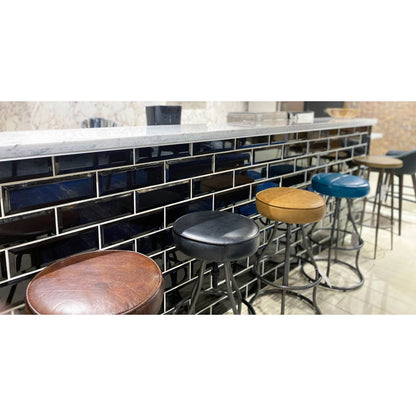 Bowie Bar Stool by LH Imports. Made from leather, metal in a rustic style.