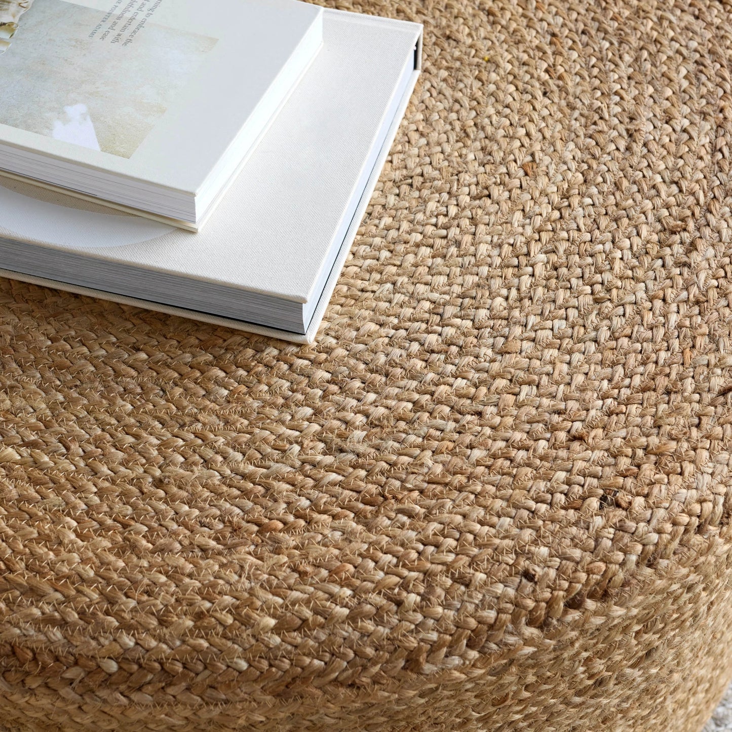 003 SI-2077391 | Closeup | Saba Stool SBT02 Pouf by Jaipur Living in tan. Made from 100% jute fiber in a rustic style.