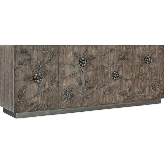 Melange Florence Four Door Credenza by Hooker Furniture in medium wood. Made from oak veneers, resin in a modern style.