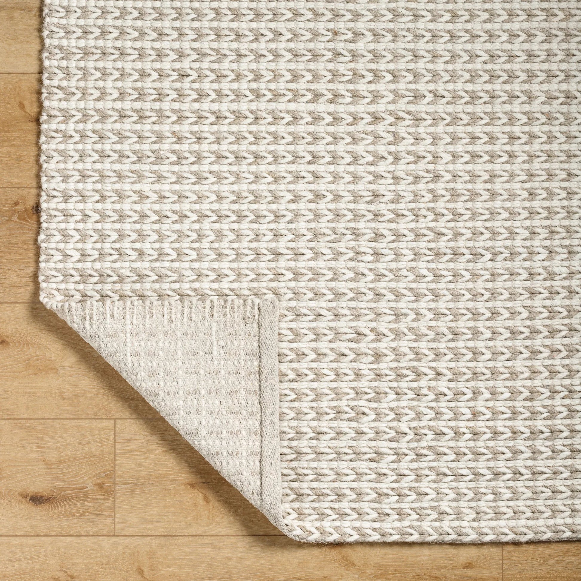 Sundance Rug - 33583 by Livabliss. Made from main: 65% wool, main: 35% polyester in a unique style.