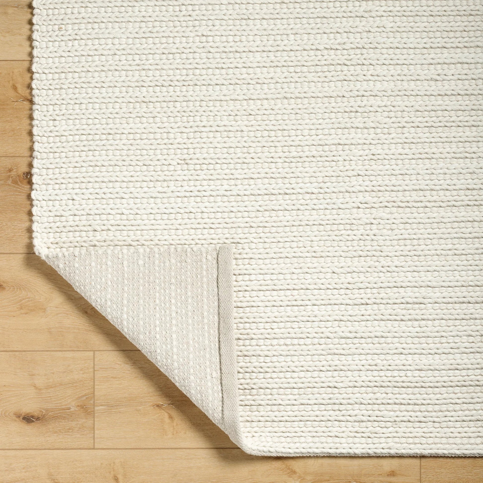 Sundance Rug - 33583 by Livabliss. Made from main: 65% wool, main: 35% polyester in a unique style.