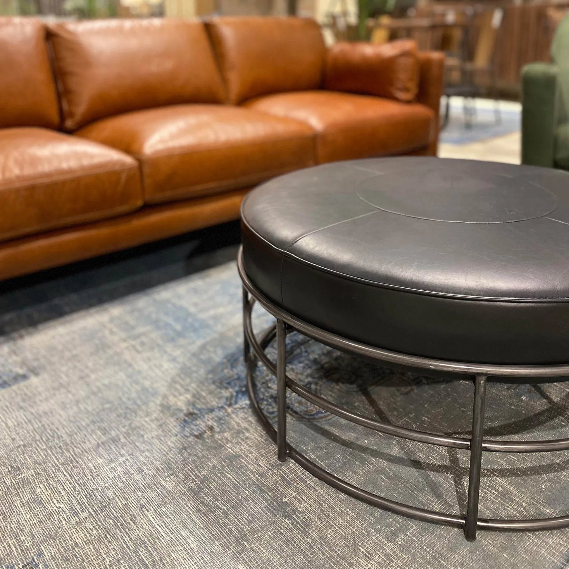 Ziggy Ottoman by LH Imports in black and gunmetal. Made from pu leather, iron, polyester fiber, pu foam in a modern style.
