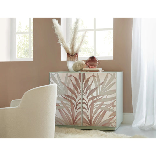 Triumph Accent Chest by Hooker Furniture in pink and mint green exterior. Made from maple veneers with tempered glass in a modern style.