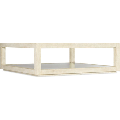 Cascade Square Cocktail Table by Hooker Furniture in pebble beach. Made from burlap, tempered glass, mirror in a modern style.
