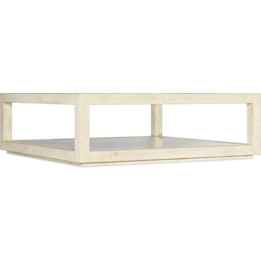 Cascade Square Cocktail Table by Hooker Furniture in pebble beach. Made from burlap, tempered glass, mirror in a modern style.