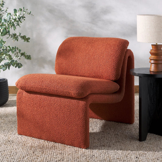 Ainslie Boucle Accent Chair by Safavieh. Made from birch, plywood iron boucle (90% polyester, 10% acrylic) polyurethane foam in a unique style.