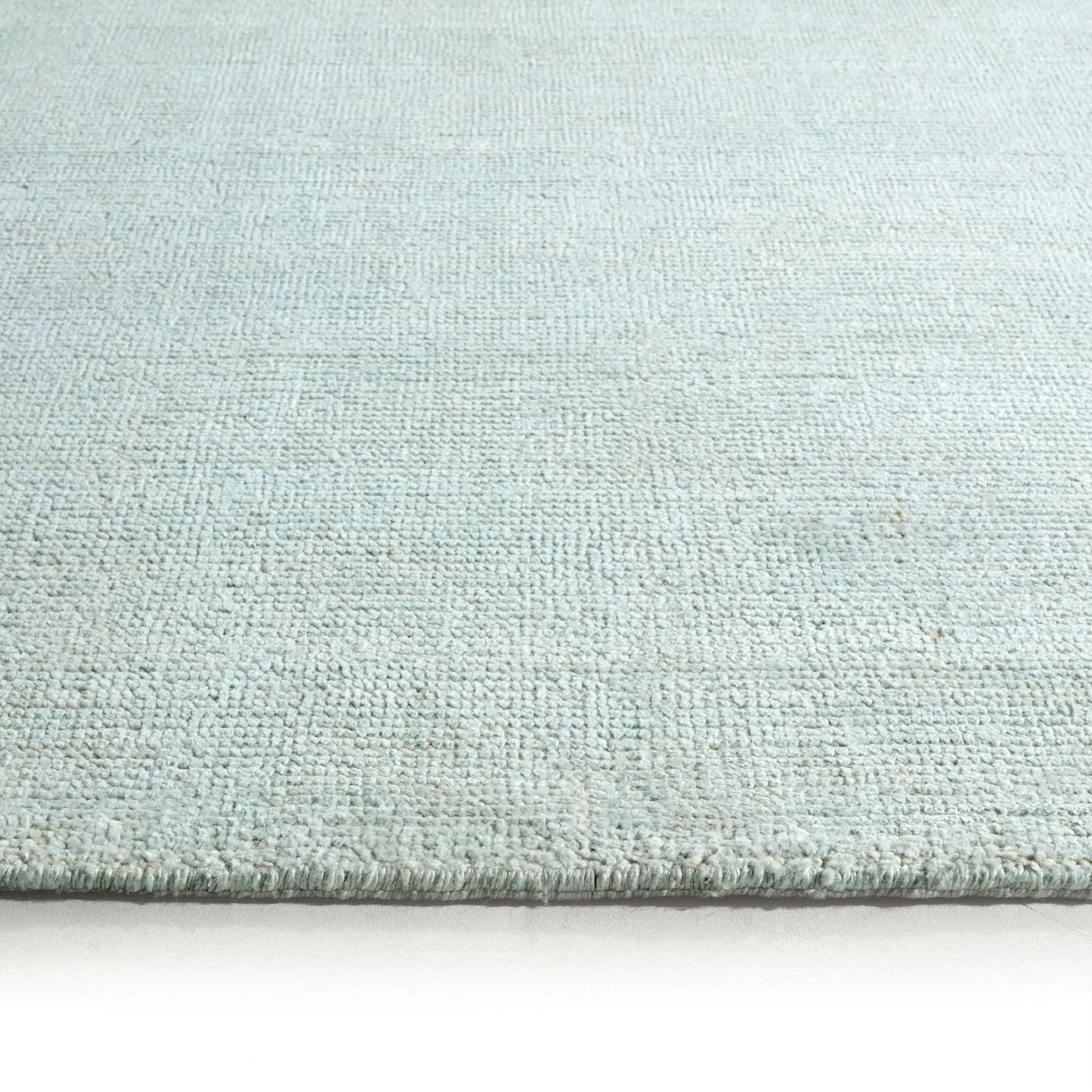 004 SI-2531404,SI-2531405,SI-2531406,SI-2531407,SI-2531408 | Closeup | Soft Horizon SFH03 Rug by Jaipur Living in ivory, white, gray. Made from 60% bamboo silk 40% wool in a unique style.