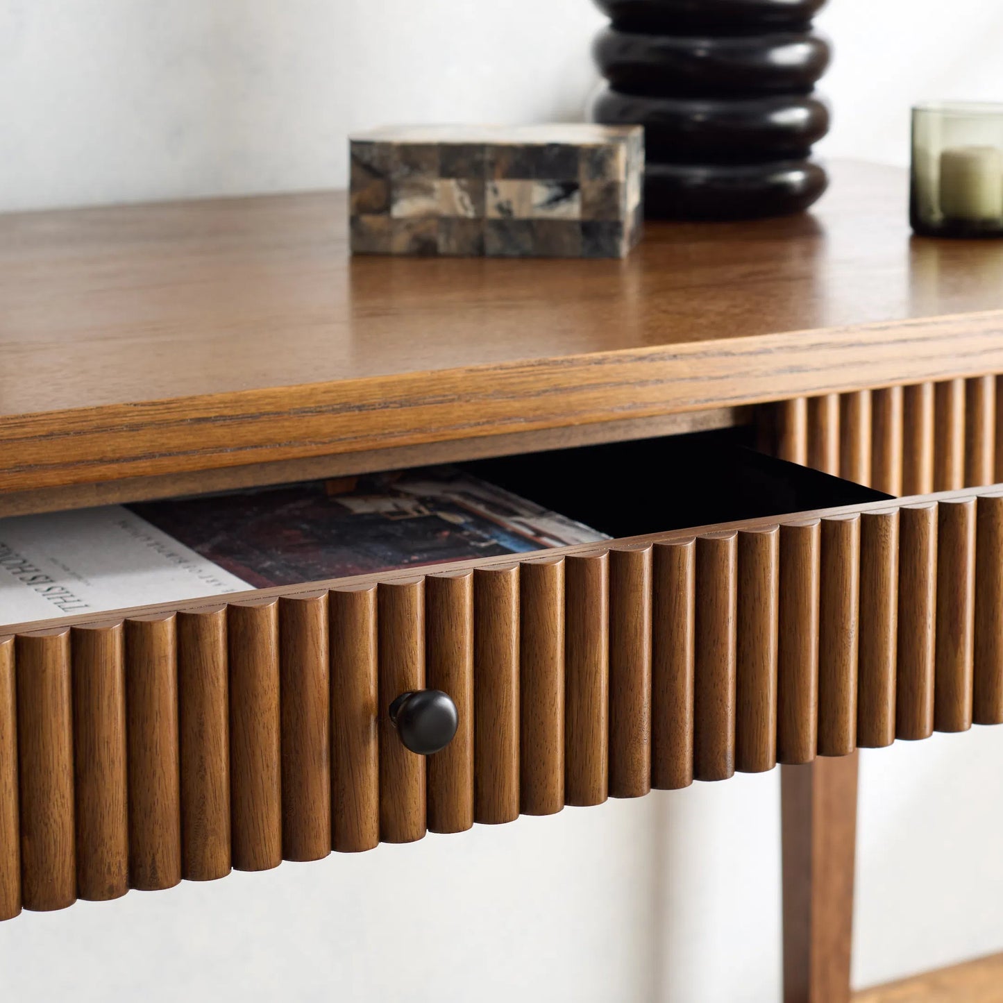 008 SI-2454124 | Lifestyle | Marion 1 Drawer Reeded Desk by HedgeApple Essentials in medium oak, black. Made from rubber wood, oak veneer, manufactured wood in a transitional style.