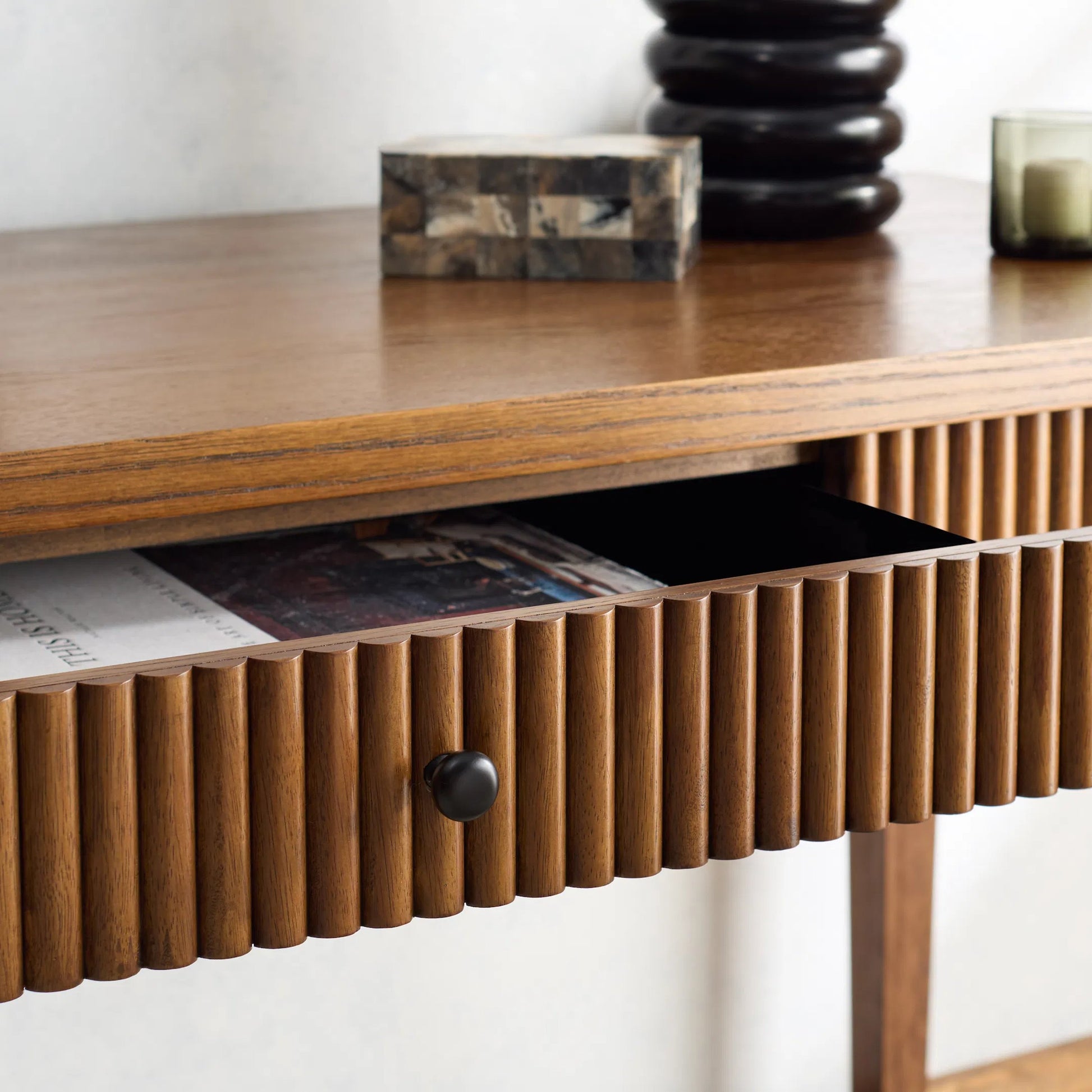 Marion 1 Drawer Reeded Desk by HedgeApple Essentials in medium oak, black. Made from rubber wood, oak veneer, manufactured wood in a transitional style.