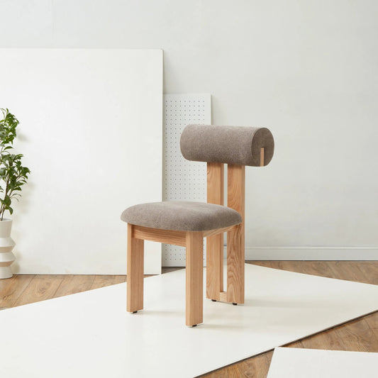 Coamo Boucle Dining Chair by HedgeApple Essentials. Made from ashwood, plywood boucle (100% polyester) ca foam in a unique style.