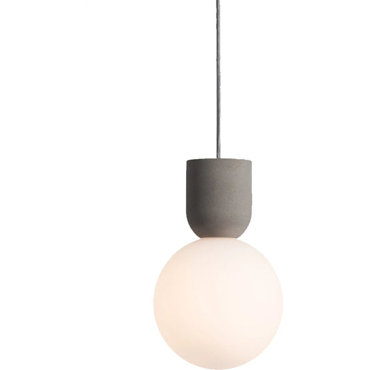 Castle Glo Pendant by Seed Design in concrete/opal glass. Made from concrete, mouth-blown glass in a modern style.