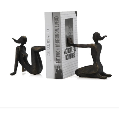 Pushing Women Bookends by Zentique in rustic dark bronze. Made from resin in a modern style.