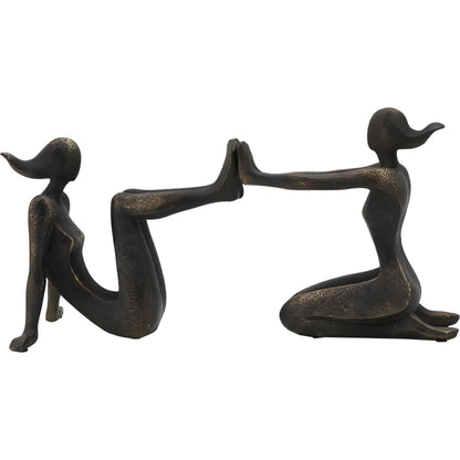 Pushing Women Bookends by Zentique in rustic dark bronze. Made from resin in a modern style.