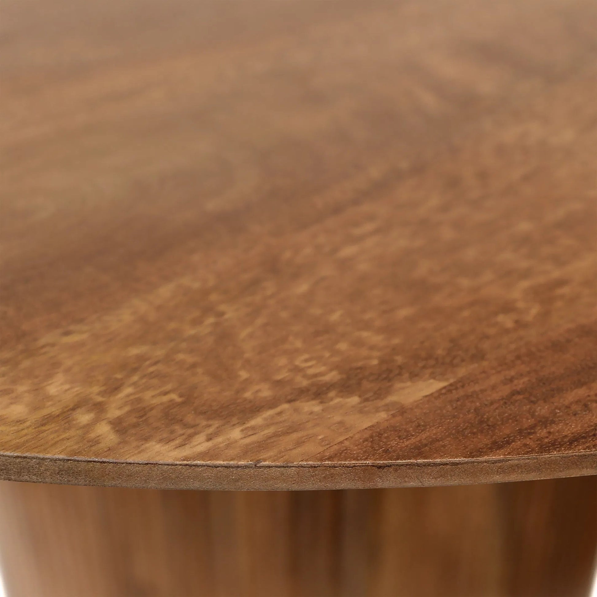 Shelva Dining Table by Arch & Plane in medium brown. Made from mango wood in a transitional style.